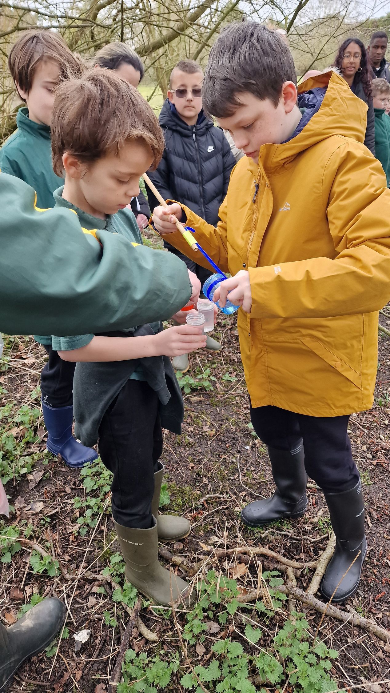 Students doing fresh water testing testing